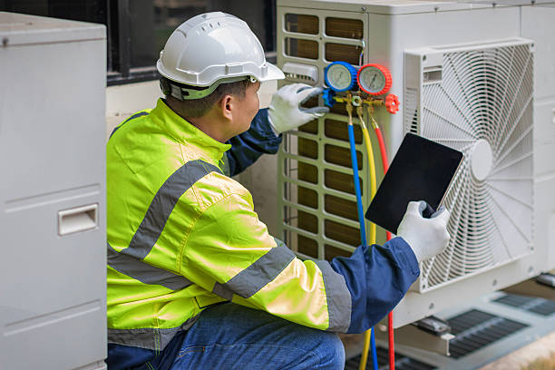 Professional Hvac Maintenance technician working in South Dartmouth, MA